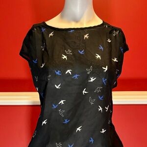 Sheer top with bird pattern